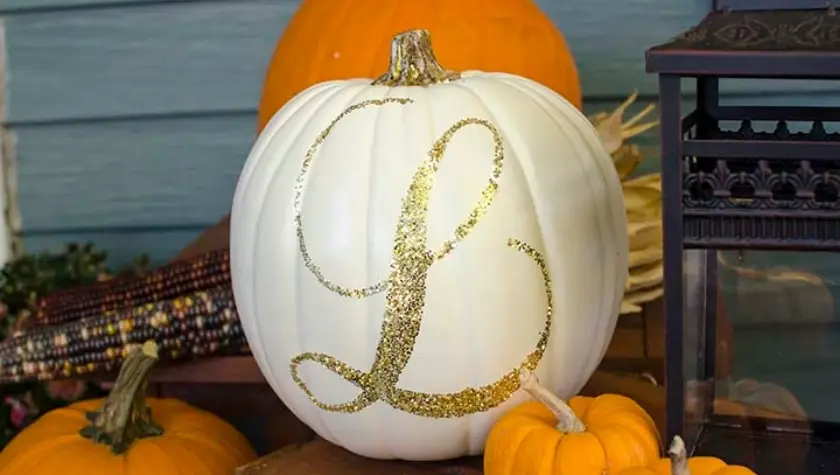 20 Unique No Carve Pumpkin Decorating Ideas: Halloween Fun glitter monogrammed pumpkin no carve idea