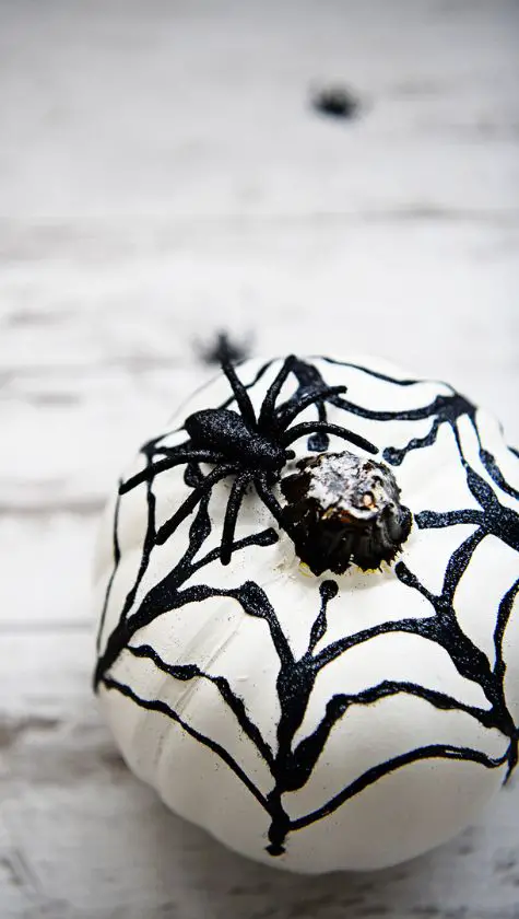 20 Unique No Carve Pumpkin Decorating Ideas: Halloween Fun No carve spider web pumpkin idea halloween